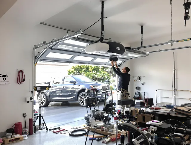 Bristol Garage Door Repair specialist installing smart garage door opener system in Bristol home